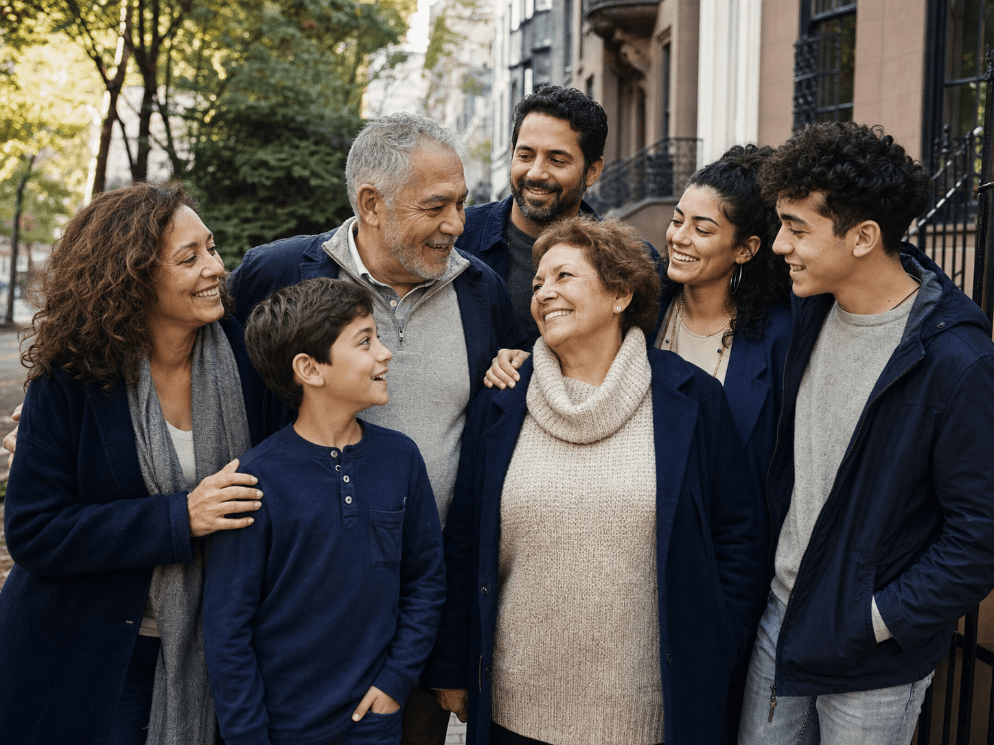 A happy multigenerational family spending time together on a city street.